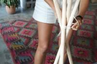 Porte-manteau avec des bâtons de bois
