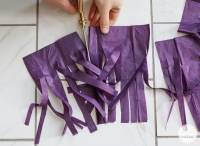 Guirlande avec des pompons en frange