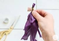 Guirlande avec des pompons en frange
