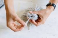 Relooker une couverture de pique-nique avec des pompons