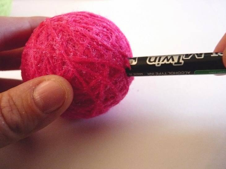 Guirlande lumineuse en boules de laine
