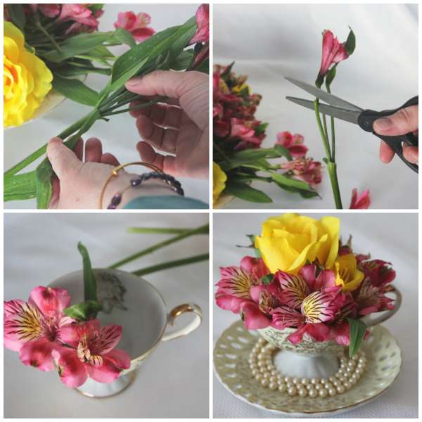 Centre de table arrangement floral dans une tasse de thé
