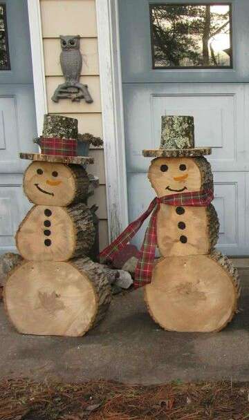 Wooden log snowmen for outdoor decoration