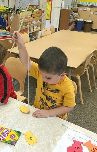 Jeu de maths la pêche aux poissons numérotés