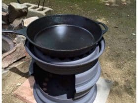 Poêle à bois avec des jantes de voiture