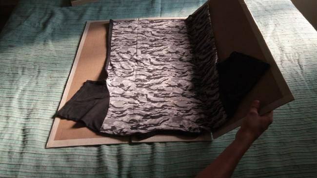 t-shirt sur un plieur à linge DIY