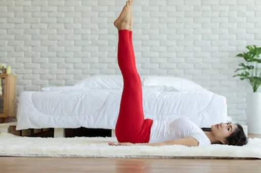 Posture jambes contre le mur