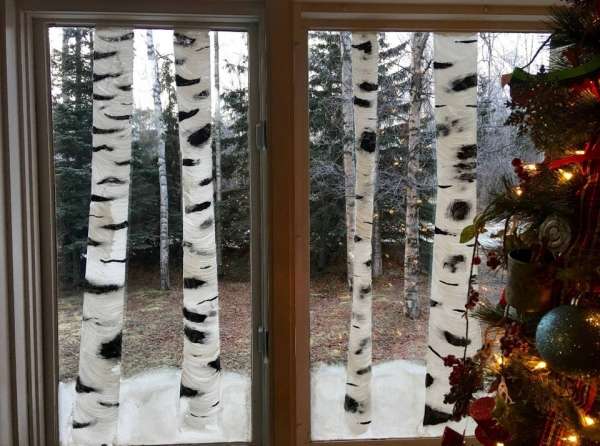 Peindre des troncs en trompe l'œil sur la fenêtre pour ajouter des arbres à son jardin