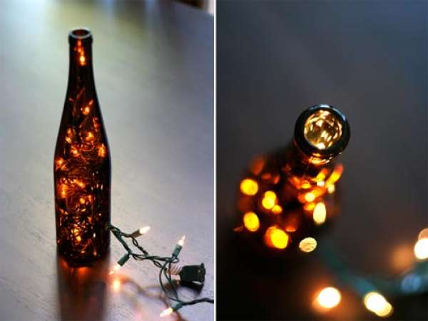 Bouteille de verre lumineuse avec une guirlande