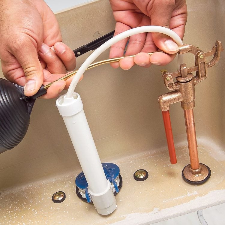 Mécanisme de chasse d'eau avec un flotteur